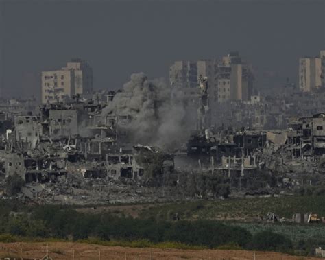 Israeli airstrikes crush apartments in Gaza refugee camp, as ground troops battle Hamas militants